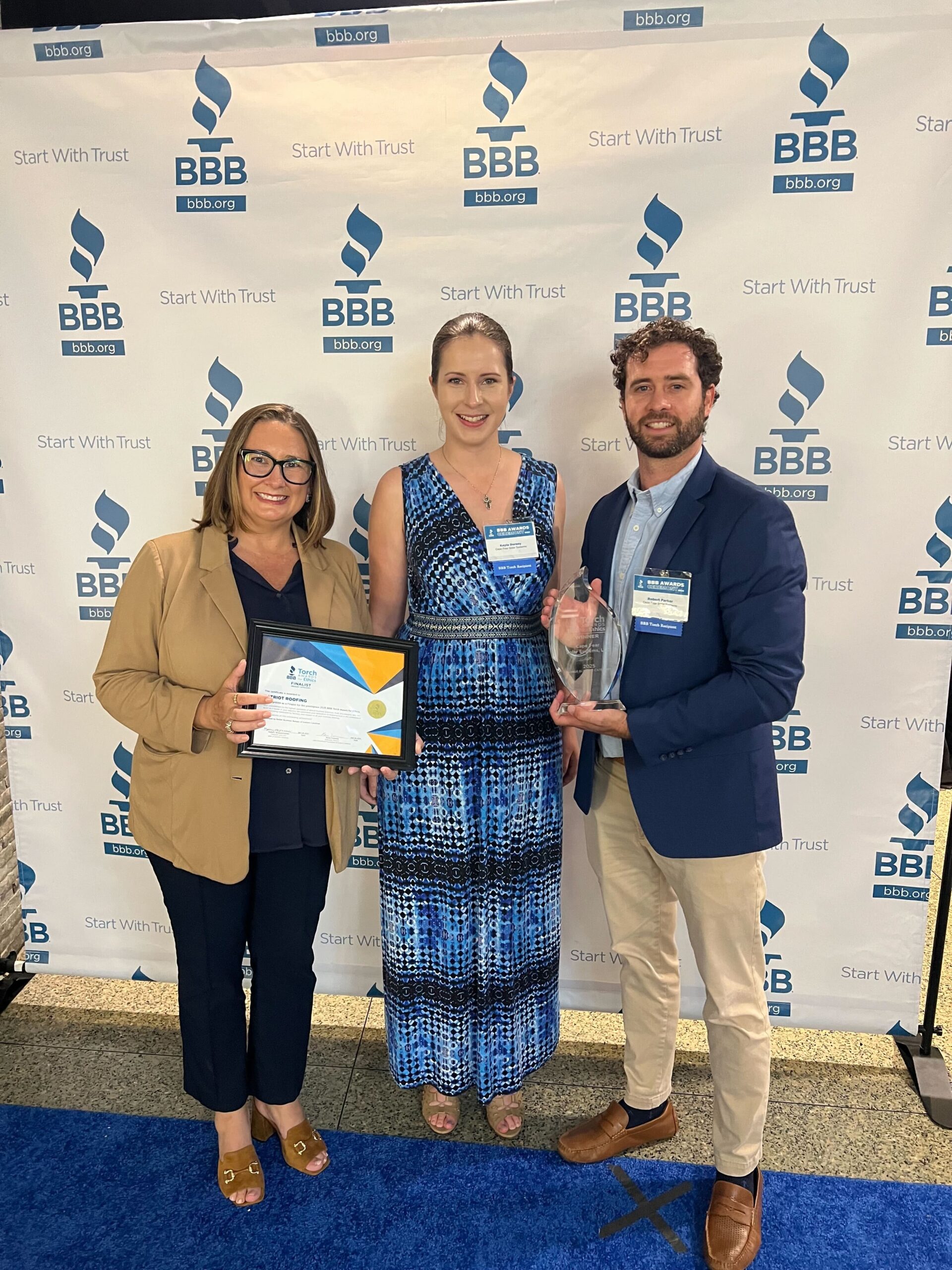 Stephanie Bolton holding BBB Award for Ethics